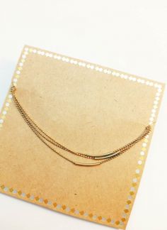 دستبند زنجیری ساده سه ردیفه همراه با پاکت هدیه - طلایی